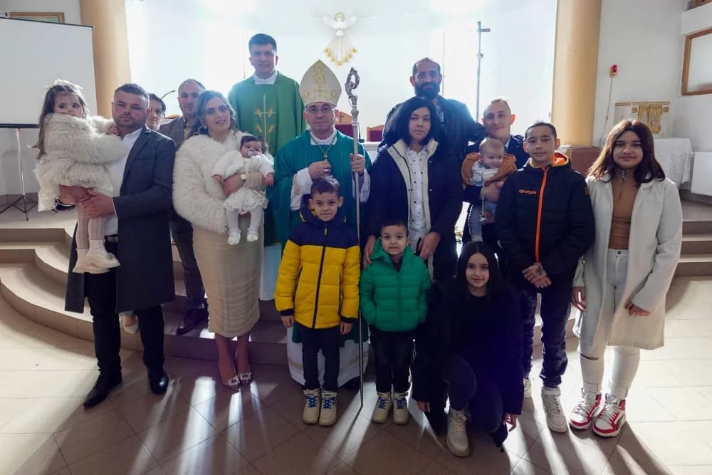 Krštenje šestog djeteta roditelja Jozić u Đulovcu