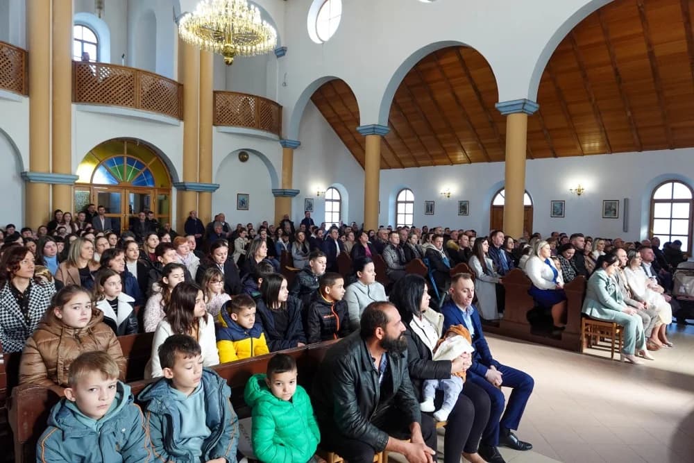 Krštenje šestog djeteta roditelja Jozić u Đulovcu