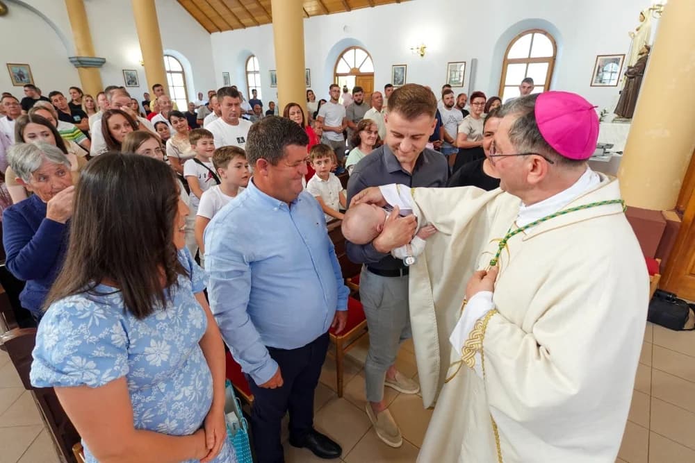 Krštenje petog djeteta roditelja Jaković u Đulovcu
